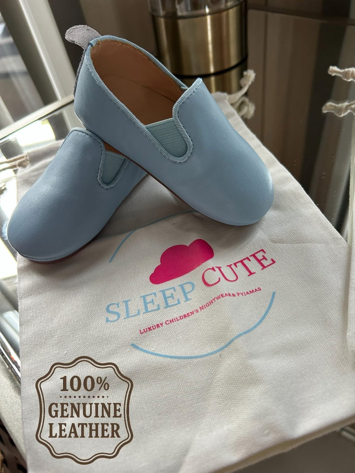 Leather blue slippers